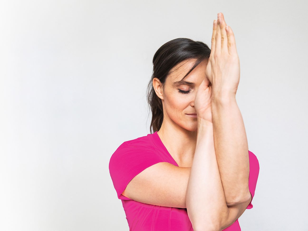 Woman practising yoga.