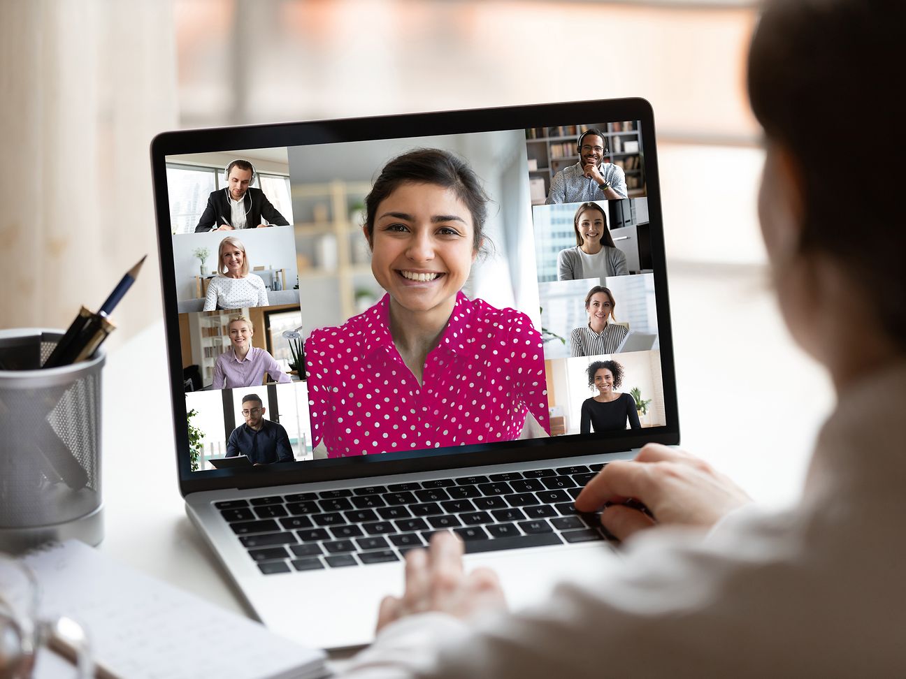 Woman in video conference using her laptop.