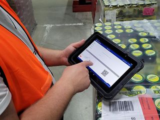 Driver signs on a tablet.