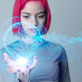  Woman holding a digital globe