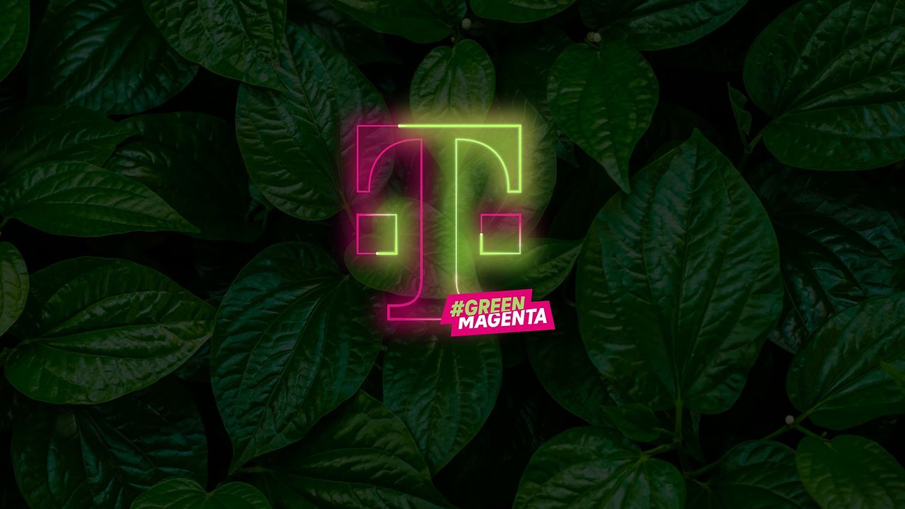 The silhouette of the new T, half magenta-colored, half green, with lettering #GREENMAGENTA