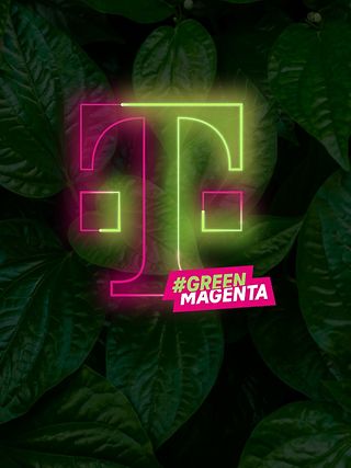 The silhouette of the new T, half magenta-colored, half green, with lettering #GREENMAGENTA