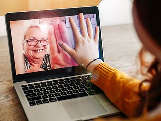 Video call between grandmother and grandchild.
