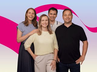 Several people smiling at the camera