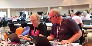 Working on "Magenta Patterns": My colleague Susanne Bruns and me. Probably the smallest team at our Promptathon.