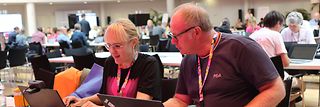 Working on "Magenta Patterns": My colleague Susanne Bruns and me. Probably the smallest team at our Promptathon.