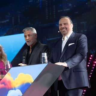 Barbara Schöneberger, George Clooney and Hagen Rickmann.