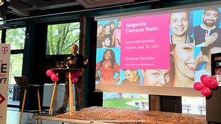  A speaker gives a presentation about the Magenta Campus Tour