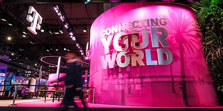 View of Deutsche Telekoms stall at MWC 2024 with slogan "Connecting your world".
