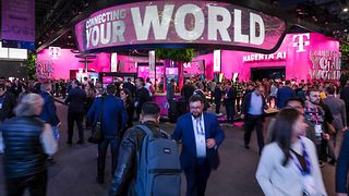 Exhibition stand, people in front of it