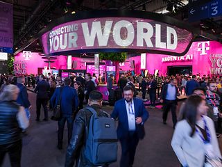 Exhibition stand, people in front of it