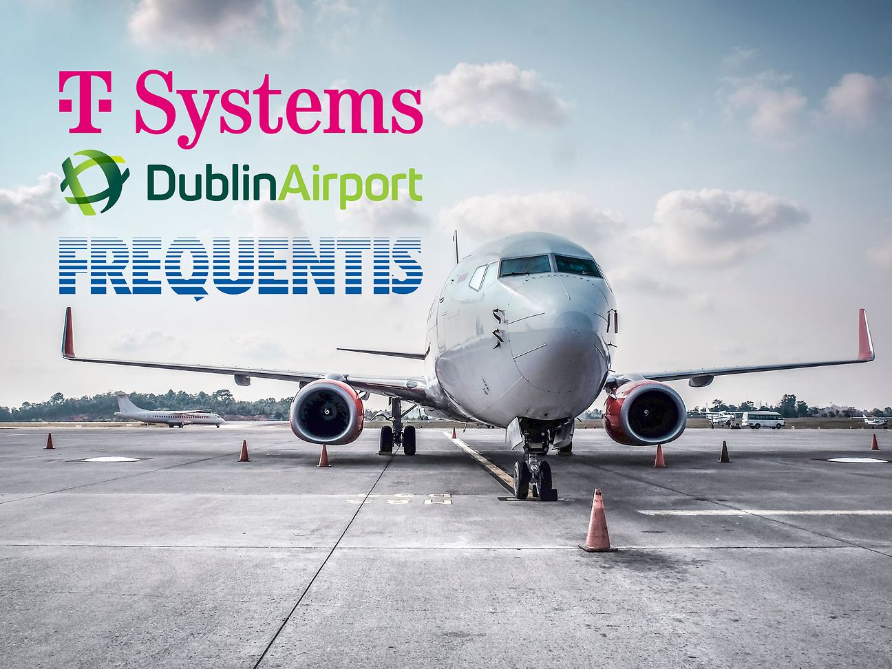 Plane with the logos of T-Systems, Dublin Airport and Frequentis.