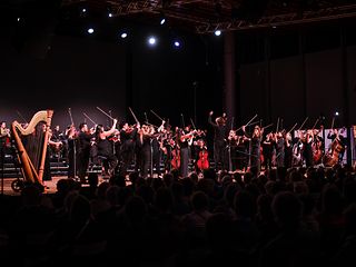 The Aurora Orchestra under its conductor Nicholas Collon