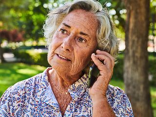 Elderly lady on the phone.