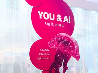 A luminous installation bearing the inscription ‘YOU & AI’