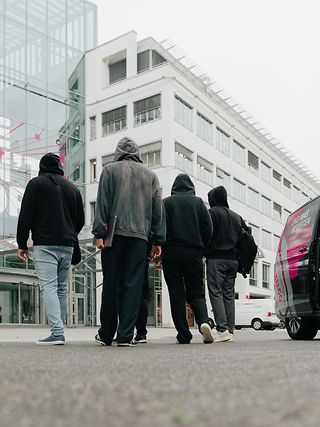 Hackers get off the shuttle bus and arrive at BugBash in Bonn