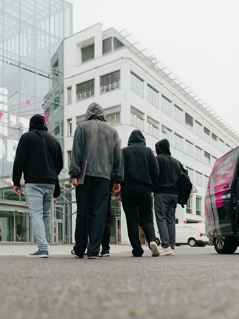 Hackers get off the shuttle bus and arrive at BugBash in Bonn