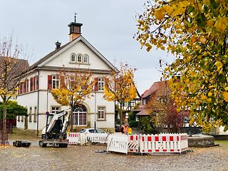 Foto Marktplatz mit Bagger