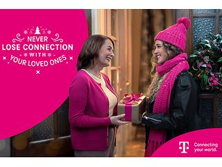 Two women exchanging presents. Claim: Never lose connection with your loved ones.