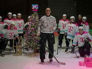 Telekom CEO Höttges und Eishockyspieler