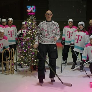 Telekom CEO Höttges und Eishockyspieler