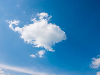 A white cloud in a blue sky