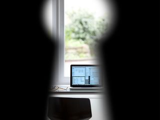 View through a keyhole on a laptop