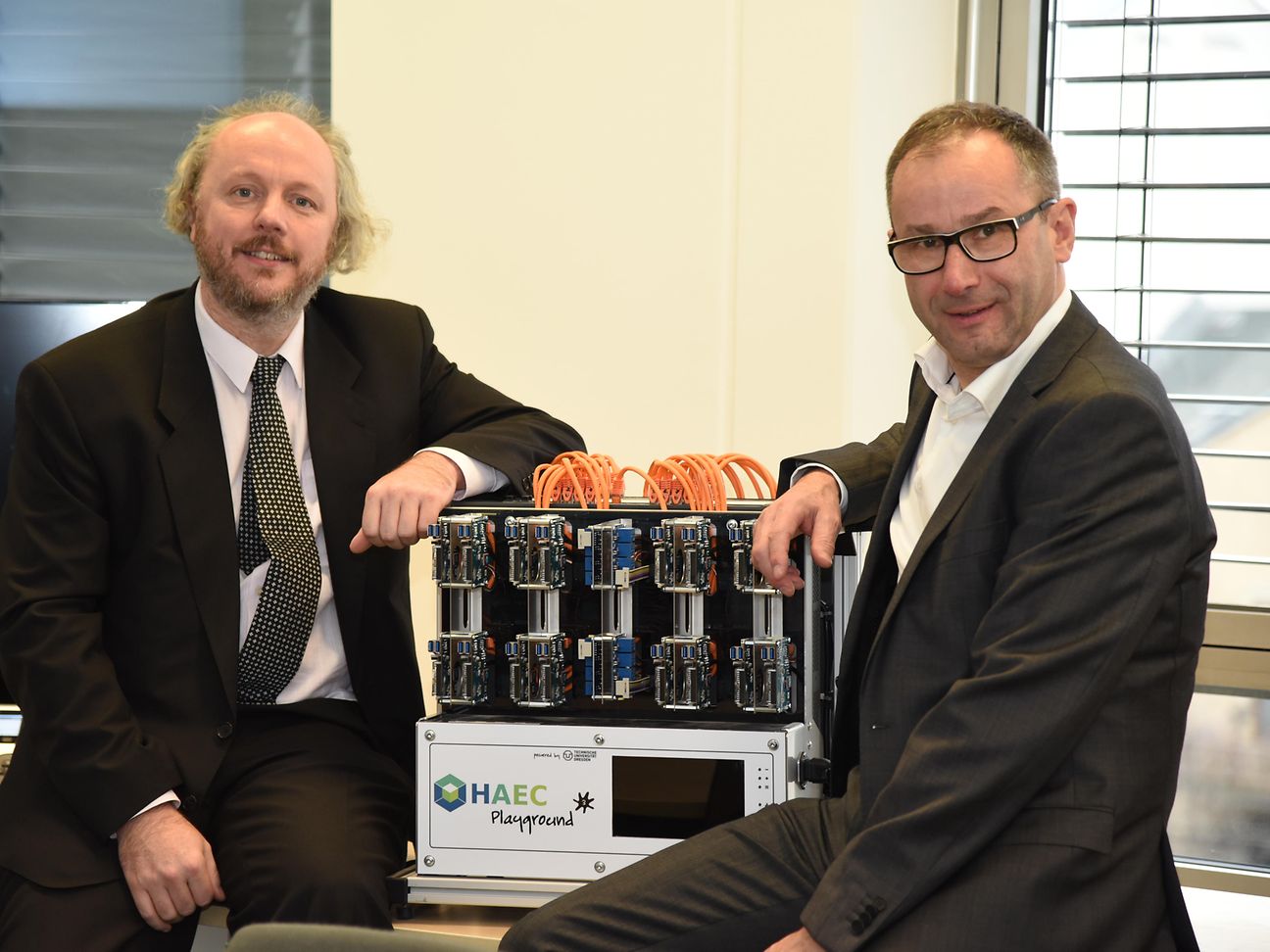 Frank Fitzek (on the left side) and Bruno Jacobfeuerborn discussing plans for 2017