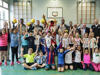 The children's excitement for the sport of basketball can be seen on the group photo taken for the event.