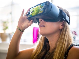 Woman wearing virtual reality glasses.