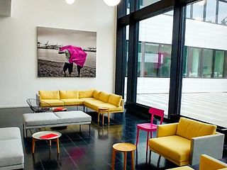 seats and sofas in a lounge area at Telekom location Hamburg