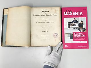 The German-Austrian Telegraphic Union's magazine and the product magazine "Mehr Magenta" (More Magenta).