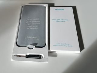 The Fairphone and a screwdriver in the packaging.