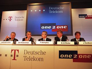 Press conference with Jürgen Kindervater, Ron Sommer, Tim Samples, Kai-Uwe Ricke and Jeffrey A. Hedberg.