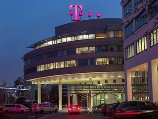 Deutsche Telekom Headquarters at night.