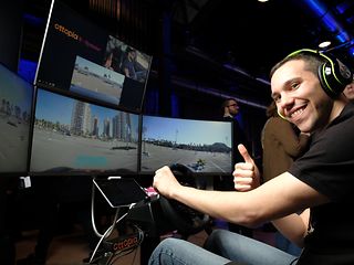 Ori Gold steering a car in Tel Aviv – real-time from Stuttgart.
