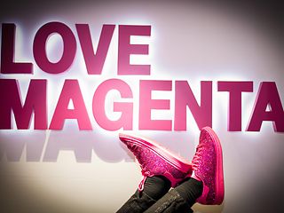 Magenta Sneakers in front of LoveMagenta 