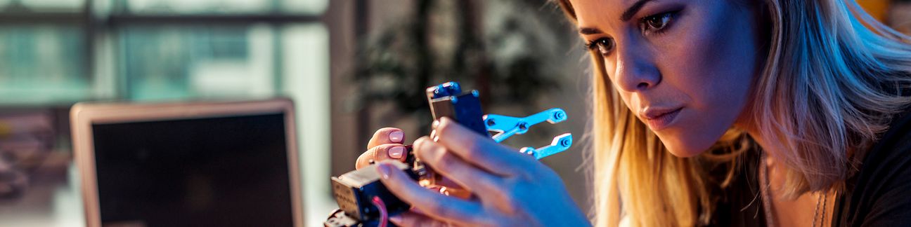 Young woman with technology