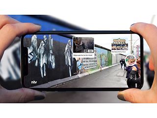 tagSpace and ntv test how to integrate news content – such as on the Berlin wall – with an AR app. 