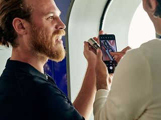 Two men with a smartphone