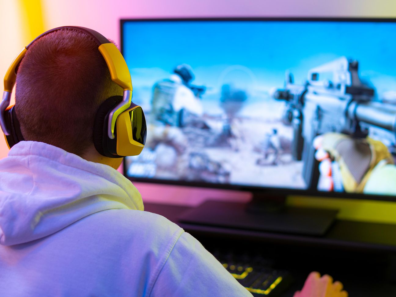Young man playing computer game.
