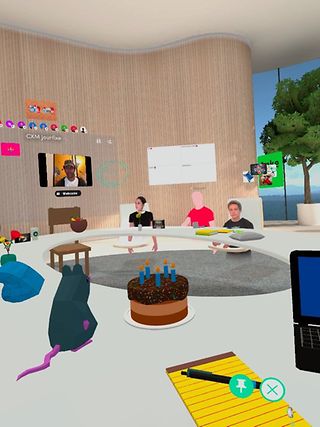 Several team members sitting at a virtual table.