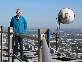  Thomas Scheel on the Hamburg television tower next to a directional radio antenna.