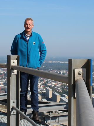  Thomas Scheel on the Hamburg television tower next to a directional radio antenna.
