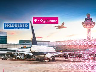 Flughafen mit Logos von <nobr>T-Systems</nobr> und Frequentis