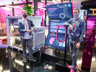 Telekom-Mitarbeiter präsentieren ihr Thema.