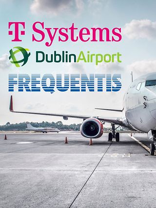 Flugzeug mit drei Logos von T-Systems, Airport Dublin und Frequentis.